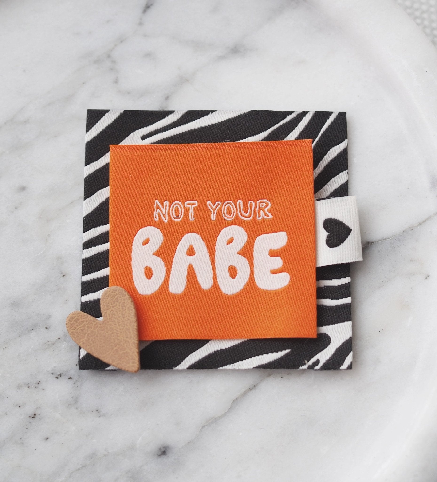 Weblabel *not your babe* orange - Paul & Clara